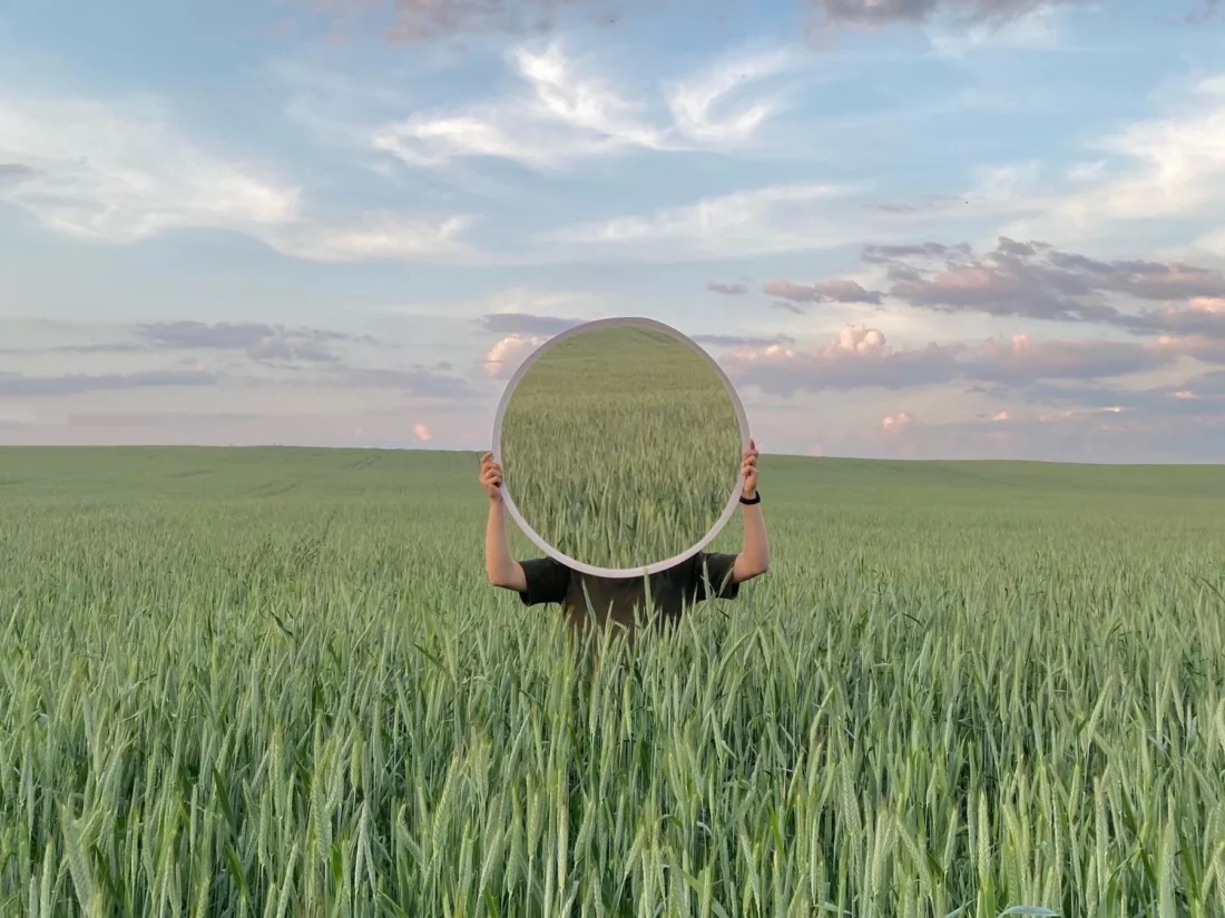 how to break drug addiction. Man in a field with a mirror by Gelatin @Pexels